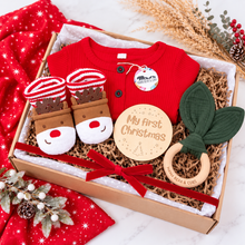 Load image into Gallery viewer, Baby’s First Christmas gift box with red baby outfit, reindeer booties, wooden keepsake and teether

